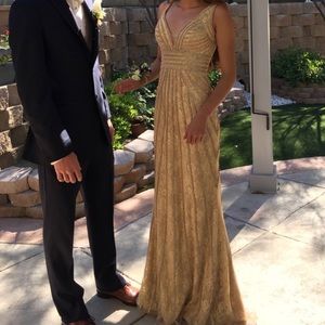 Gold jeweled prom dress